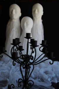 Cheese Cloth Ghosts - Make these creepy looking ghosts with cheese cloth, glue and wig heads. Awesome decorations for Halloween! #Halloween #Decorations #Ghosts #Spirits