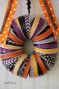 Halloween Wreath - Make this darling Halloween wreath with mason jar rings and washi tape. #Halloween #Craft #DIY