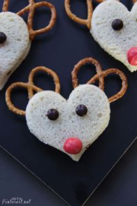 Rudolph The Red Nosed Reindeer Sandwiches - These adorable sandwiches only take minutes to make. The adults enjoyed them just as much as the kids did! #Christmas #Reindeer #Rudolph #Recipe