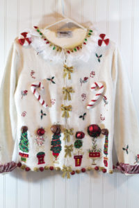 Ugly Christmas Sweater - This sweater easy and quick to make, purchase a thrift store Christmas Sweater then embellish it to make the ugliest sweater ever!