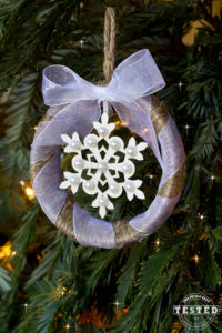 Mason Jar Ring Ornament - Making this rustic Mason Jar ring ornament is a quick and easy Christmas project. They look lovely on a tree, or used to adorn wrapped gifts!