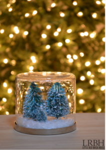 Christmas Snow Globes - Make a charming Christmas snow globe in no time with a few craft supplies. They will bring the magic of Christmas wherever you display them!