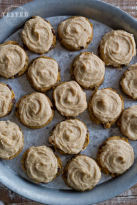 Peanut Butter Pumpkin Cookies - Peanut butter, pumpkin and chocolate chips come together in a moist, rich, chewy cookie to good to resist. Topped with creamy peanut butter, cream cheese frosting for the ultimate cookie experience!