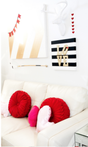 Valentine's Day Idea -Glitter & Stripes Craft - Add some bling to your Valentine's Day decor with this quick and easy glitter and stripes Love wall decor. Add a red banner, Cupid's arrow and heart pillows to complete the look!