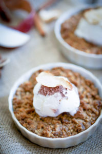 This is an easy apple crisp recipe with a buttery, crunchy oat streusel topping spread over warm, sweet apples. It's gluten free and vegan to boot!