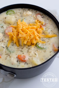 Chicken Potato Chowder - This is comfort food at it's best! Fresh vegetables and chicken surrounded in a creamy, cheesy chicken broth. It's quick and easy to make, a perfect dinner on a busy night!