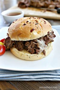 Served on an onion roll for another level of flavor and topped with melted Swiss for a mouthwatering roast beef sandwich