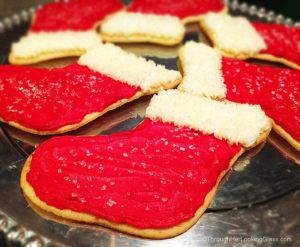 Addictive buttery Christmas Stocking Cookies. It's just not Christmas at my house without these light, crunchy roll-out Christmas cookies with buttercream.