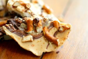 Peanut butter pretzel bark is an easy, sweet-salty candy you can make at home. From RestlessChipotle.com