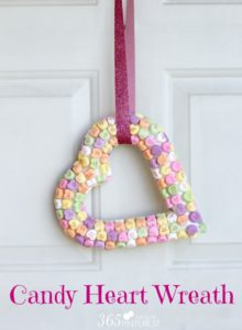 This Candy Heart Wreath is adorable and super easy to make! You could do this project with a variety of candies, but I opted for candy hearts because they are colorful, cheap and they taste awful so no one in my family actually wants to eat them. ;) So gather up a few supplies, warm up your hot glue gun and get to work!